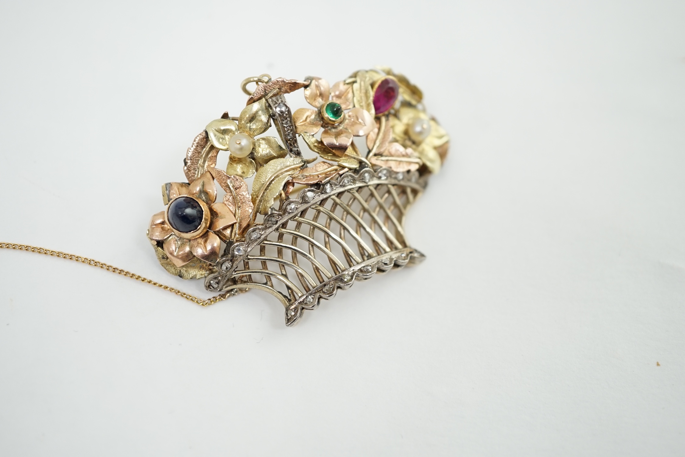 A late 19th century Continental two colour gold, silver, diamond, sapphire, ruby, emerald and pearl set giardinetto pendant brooch